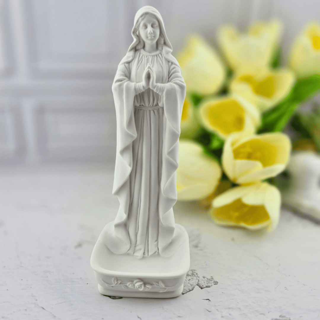 A white resin figurine of the Virgin Mary standing with hands in prayer, holy water font, Sister Dulce Gift Shop, Shepherds Staff, Religious Store, Cypress Springs Mercedarian Prayer Center, Catholic, new item, home decor