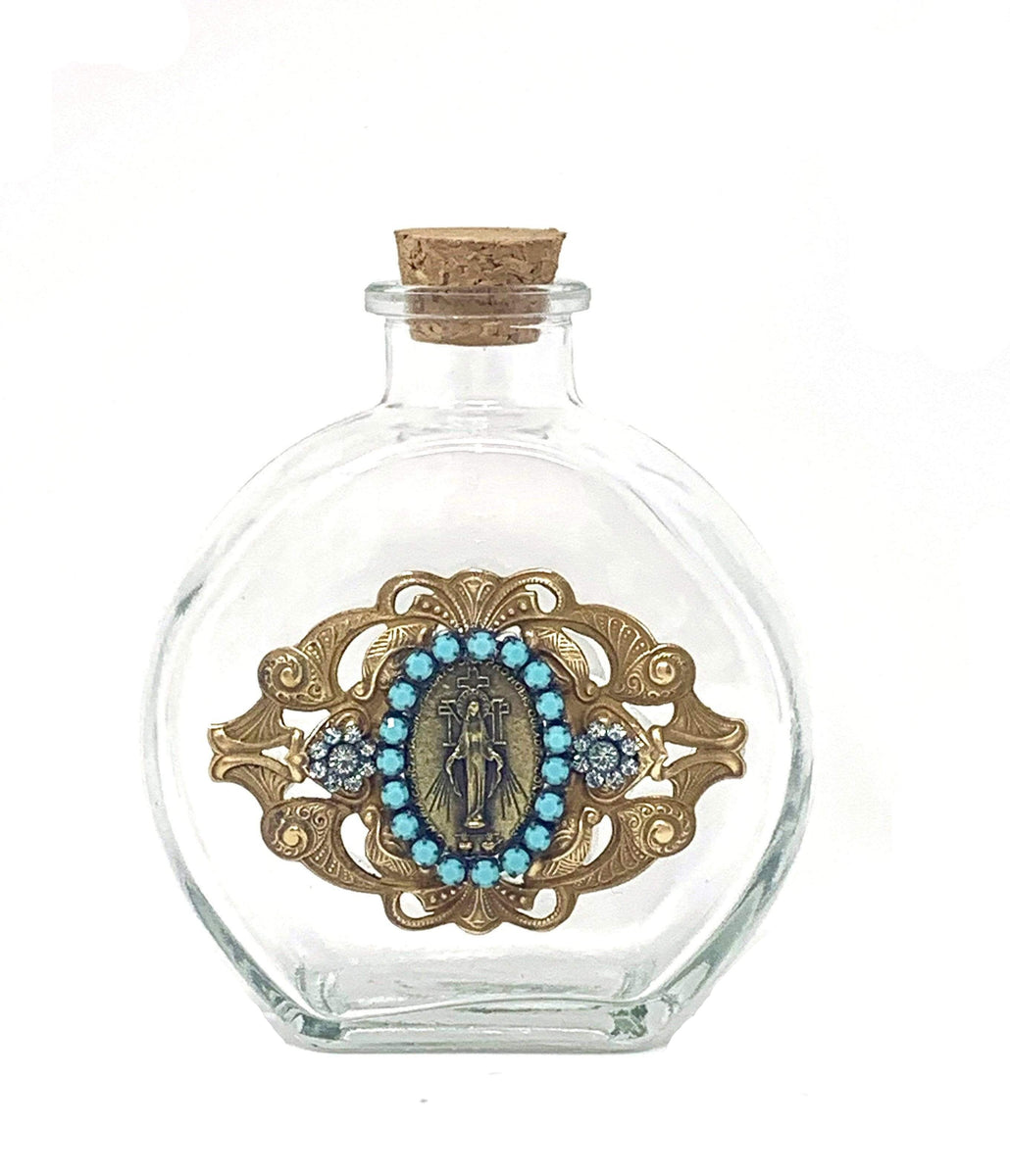 http://shepherdsstaffgiftshop.com/cdn/shop/products/vintage-holy-water-bottle-miraculous-medal-with-blue-beading-holy-water-bottle-contreras-religious-art-28142399127626_1200x1200.jpg?v=1630269823