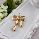 gold bow charm for charm necklace and bracelet, sister dulce, bows, shepherds staff gift shop