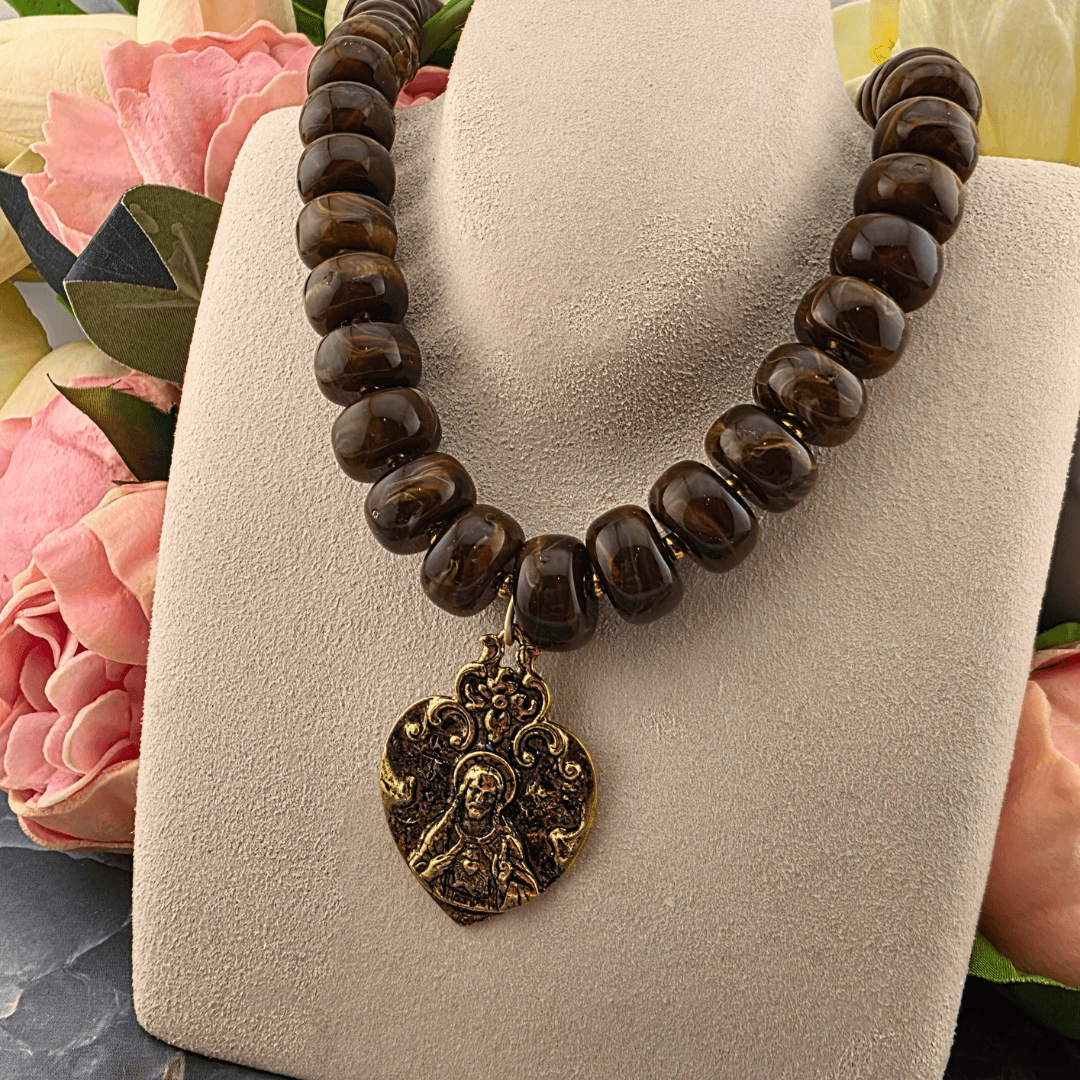 Sister Dulce Gift Shop, Shepherds Staff, Religious Store, Cypress Springs Mercedarian Prayer Center, Catholic, A beaded necklace with dark brown polished tiger's eye-like beads and an ornate antique gold pendant