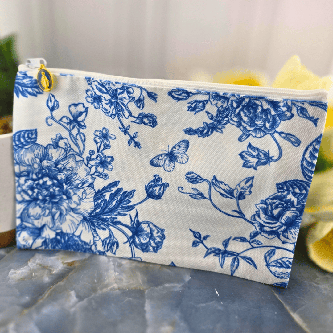 A fabric zip pouch with a blue floral toile, Sister Dulce Gift Shop, Shepherds Staff, Religious Store, Cypress Springs Mercedarian Prayer Center, Catholic, new item, make up bag