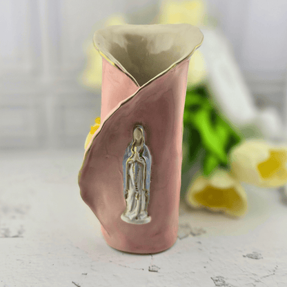 A pink ceramic flower vase with a gold-leafed rim, featuring Our lady of the rosary on the front, Sister Dulce Gift Shop, Shepherds Staff, Religious Store, Cypress Springs Mercedarian Prayer Center, Catholic, new item, popular item, sacred treasures, home decor
