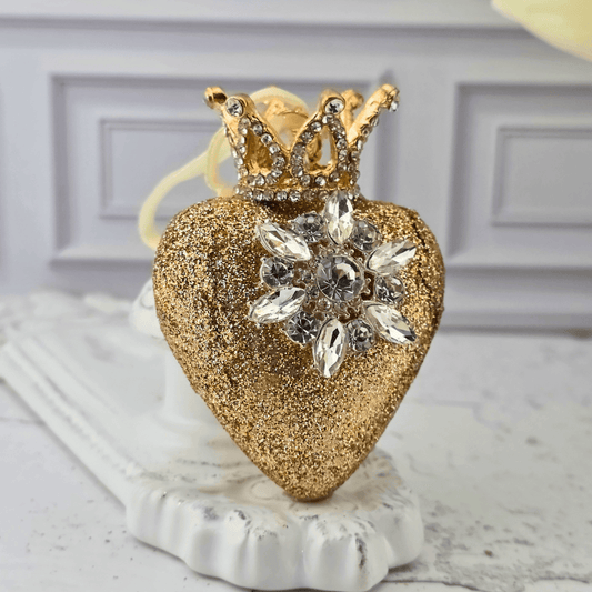 A gold glitter heart ornament with a crown and rhinestone flower embellishment, Sister Dulce Gift Shop, Shepherds Staff, Religious Store, Cypress Springs Mercedarian Prayer Center, Catholic, popular item, christmas ornament, new item 