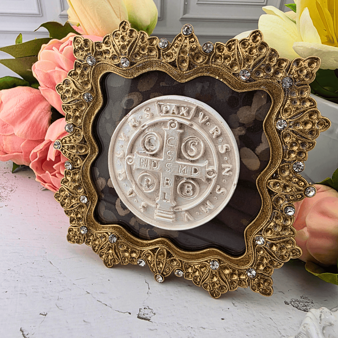 An ornate gold-toned decorative frame with a white Saint Benedict medallion, Sister Dulce Gift Shop, Shepherds Staff, Religious Store, Cypress Springs Mercedarian Prayer Center, Catholic, new item, popular item, home decor, gift for her, young adult