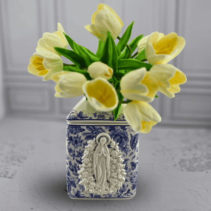 A square blue-and-white ceramic vase featuring a white relief of the Virgin Mary, tissue holder, Sister Dulce Gift Shop, Shepherds Staff, Religious Store, Cypress Springs Mercedarian Prayer Center, Catholic, new item 