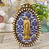 Oval Pearl and Gold Frame With Handmade Reliefs Virgin Mary on Blue Background Artwork Raz Imports