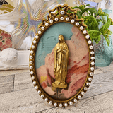 Oval Pearl and Gold Frame With Handmade Reliefs Virgin Mary on Pink and Blue Background Artwork Raz Imports